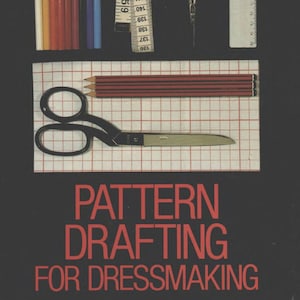 May include: An image featuring sewing and drafting tools. Pencils, pins, scissors, a measuring tape, and a ruler are arranged on a dark background. The text "PATTERN DRAFTING FOR DRESSMAKING" is displayed in red.