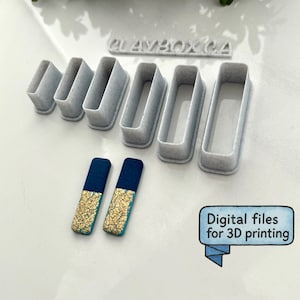 May include: A collection of gray rectangular clay cutters and two rectangular earrings with a gold leaf design and dark blue tops. The image includes the text "CLAYBOX CA" and "Digital files for 3D printing."