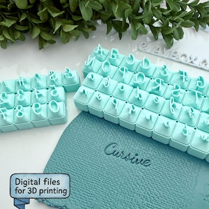 May include: A set of three ceramic mugs with a speckled, matte finish. The mugs are in shades of cream, light gray, and dark gray. Each mug has a simple, minimalist design, perfect for coffee or tea.