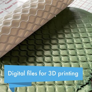 May include: A white 3D printed rolling pin with a wavy pattern is being rolled over a green textured surface. The text "Digital files for 3D printing" is displayed on a blue banner.