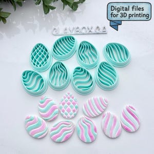 May include: A selection of light blue egg-shaped cookie cutters and decorated Easter eggs in pastel shades. The cutters feature different textured patterns. The text "Digital files for 3D printing" is in a speech bubble.