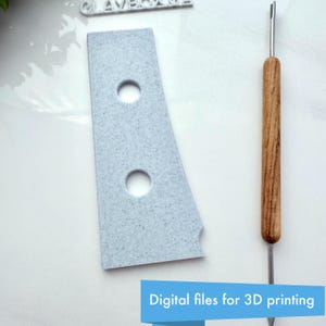 May include: A light gray, textured 3D-printed tool with two circular holes and a wooden-handled sculpting tool. The text "Digital files for 3D printing" is displayed on a blue banner.