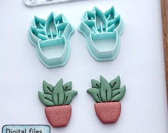 May include: Two light blue succulent-shaped cookie cutters and two finished succulent figurines in terracotta pots. The figurines have green leaves and are made from a textured material. The text "Digital files for 3D printing" is visible.