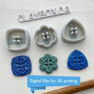 May include: Set of three 3D printed cookie cutters in the shape of a square, flower, and triangle. The cutters are white and have a speckled texture. Below the cutters are three polymer clay buttons in blue and green with a geometric pattern. The buttons are made using the cookie cutters. The text "CLAYBOX.CA" and "Digital files for 3D printing" are also visible in the image.