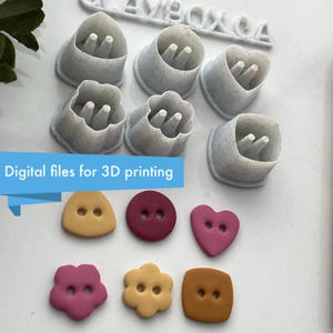 May include: Set of six 3D printed molds for making polymer clay buttons. The molds are in the shapes of a heart, flower, square, and triangle. The molds are white with a speckled texture. The image also shows six polymer clay buttons in various colors and shapes, including a heart, flower, square, and triangle.