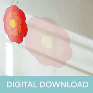 May include: Two digital printable wall art designs featuring stylized flowers. The first flower is red with a yellow center and the second flower is pink with a yellow center.