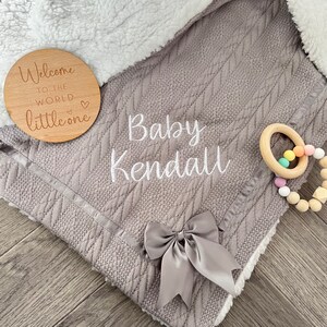 Personalised embroidered cable knit baby blanket with sherpa back makes the perfect gift for newborn baby embroidered with babies name
