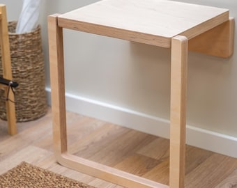 Silla plegable de pared: asiento minimalista que ahorra espacio para la entrada