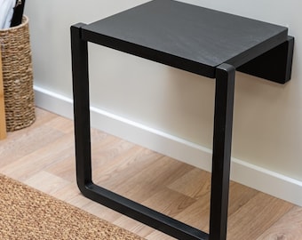 Silla plegable de pared