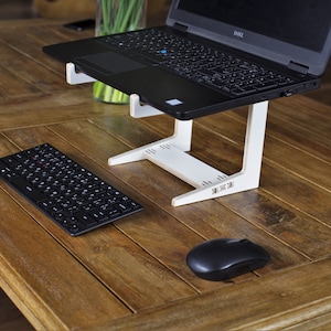 Soporte minimalista para computadora portátil