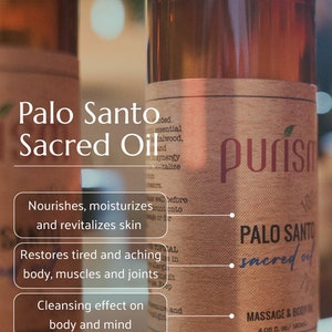 Puede incluir: Una botella de vidrio marr&oacute;n con una etiqueta que dice "Palo Santo Sacred Oil" y "purism". La botella est&aacute; llena de un l&iacute;quido marr&oacute;n claro. La etiqueta tambi&eacute;n dice "Nourishes, moisturizes and revitalizes skin", "Restores tired and aching body, muscles and joints", y "Cleansing effect on body and mind". La botella est&aacute; etiquetada como aceite de masaje y cuerpo y es de 120 ml.