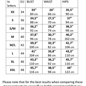 May include: A size chart for clothing with measurements in inches and centimeters. The chart shows sizes XS through XXL with corresponding bust, waist, and hip measurements.