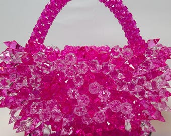 Aurora Damen-Handtasche mit Nieten und Perlenbesatz, pink und transparent, ideal für jedes Outfit und besondere Anlässe.
