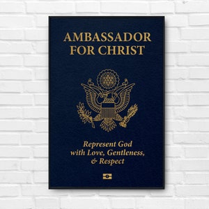 May include: A blue passport-style card with the words "Ambassador for Christ" in gold lettering. The card features a gold seal with an eagle and the words "Represent God with Love, Gentleness, & Respect".
