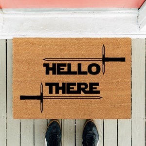 Hello There | Funny Doormat | Movie Doormat | New Homeowner Door Mat | Front Door Rug | Housewarming Gift | Funny Gift | Lightsaber Mat