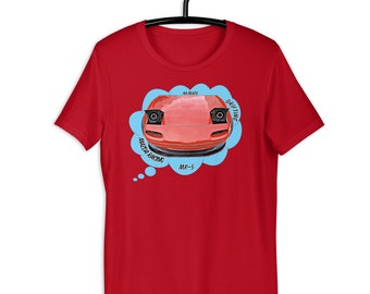 May include: Red t-shirt with a blue thought bubble featuring a red Mazda MX-5 Miata with the text "Miata Drifting Mazda Racing MX-5"