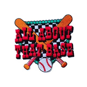 May include: Embroidered patch with the text "ALL ABOUT THAT BASE" in red, outlined in black, with a baseball and crossed bats. The background is a black and white checkered pattern, with green beads around the top.