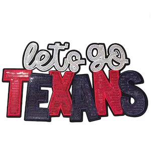 May include: A sequined patch with the words "let's go TEXANS" in red, navy blue, and white. The text is outlined in black. The patch is designed for apparel and accessories.