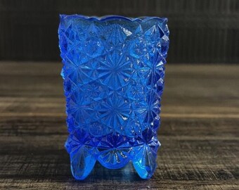 Vintage blauwe glazen tandenstokerhouder met madeliefjesknop