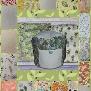 May include: A quilted appliance cover with a cactus print, featuring a white pocket and a light green trim. Surrounding the cover are fabric swatches with floral and leaf patterns in various colors, including red, yellow, and green.