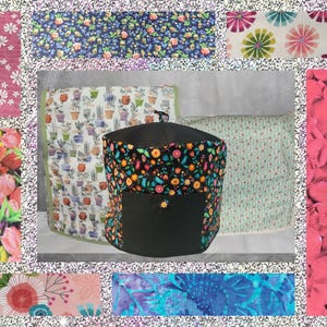 May include: A black and floral patterned kitchen appliance cover with a matching pocket and a handle. The cover is surrounded by fabric swatches with floral and botanical patterns, including tulips and daisies.
