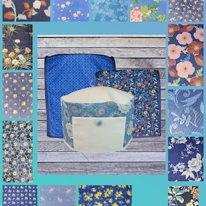 May include: A set of three ceramic mugs with a speckled, matte finish. The mugs are in shades of cream, light gray, and dark gray. Each mug has a simple, minimalist design and a rounded handle.