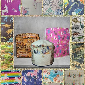 May include: A collection of fabric items with various patterns, including unicorns, dinosaurs, horses, and llamas. The items appear to be covers or cases, with a quilted, off-white item in the center featuring a chicken design and a pocket.