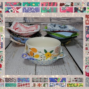 May include: A set of four bowl cozies made from colorful fabric with various holiday patterns. The cozies are in a variety of colors, including red, green, blue, and white. The cozies are designed to keep bowls warm and prevent them from slipping on surfaces.