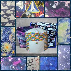 May include: A cylindrical fabric cover featuring a vibrant rainbow scalloped pattern on a white background, with a solid white front pocket secured by a single rainbow-colored button, surrounded by a collage of various space-themed fabric swatches.