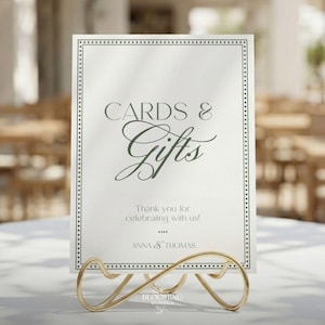 May include: A set of three ceramic mugs with a speckled, matte finish. The mugs are in shades of cream, light gray, and dark gray. Each mug has a simple, minimalist design and a rounded handle.