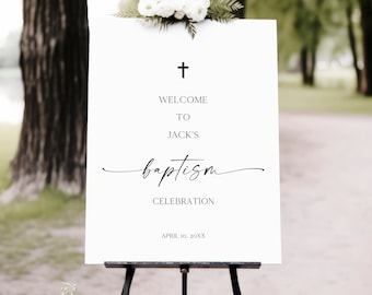 May include: White sign with black text announcing a baptism celebration for Jack. The sign includes a cross, the word "baptism" in cursive, and the date "April 10, 20XX".