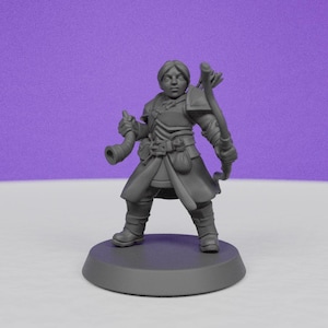 May include: A gray miniature figure of a fantasy character, standing on a circular base. The figure is dressed in detailed armor and carries a bow and horn. The character has a determined expression, ready for adventure.