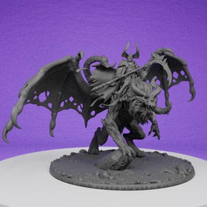 May include: A gray, detailed miniature figurine of a demon riding a winged beast. The demon is holding a staff and has horns. The beast has sharp claws and teeth.