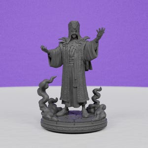 May include: A gray figurine of a robed figure with outstretched arms, wearing a tall hat and ornate clothing. The figure stands on a circular base with swirling smoke-like details. The background is a solid purple.