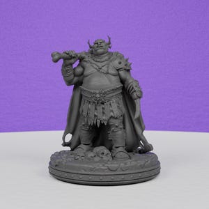 May include: A gray figurine of a fantasy ogre-like creature, holding a bone club. The figure has horns, a cape, and armor, standing on a detailed circular base with skulls. The background is a solid purple.