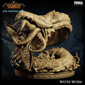 May include: A detailed, beige-colored, 3D printed model of a water worm from the Uncharted Kingdoms: The Shining Flow game. The water worm is depicted with a ship in its mouth, and the model is set on a base with a textured surface.