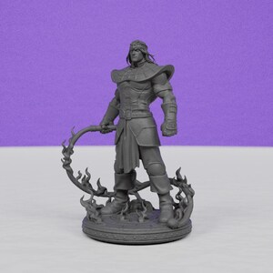 May include: A gray figurine of a male warrior, standing on a circular base with flames. The warrior wears armor, a headpiece, and holds a curved weapon. The background is a solid purple.