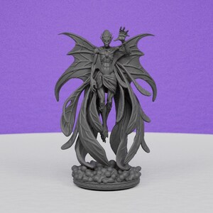 May include: A gray figurine of a winged humanoid creature with large, bat-like wings and flowing drapery. The figure is standing on a cloud-like base, with one hand raised in a gesture. The background is a solid purple.