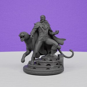 May include: A gray figurine of a man in a long coat and a snarling panther. The man is standing on a tiered platform, with his mouth open in a yell. The panther is positioned to the man's left.