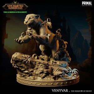 May include: A gray, sculpted figurine of a panther leaping from a rock, engulfed in flames. The figurine is part of the Uncharted Kingdoms: The Luminous Fragment collection. The text "VENYVAR - THE SHADOW OF NIGHT" is printed below the figurine.