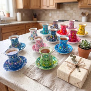 Colorful Turkish tea cups with saucers in a home kitchen, handmade ceramic set with gift box, tea lover gift idea, and housewarming tea service.