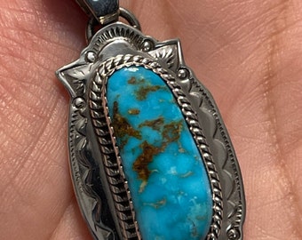 Native made turquoise pendant