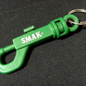 Retro jaren 1980 zeldzame SMAK Jeans echte originele groene plastic sleutelhanger niet Pepe Vintage afbeelding 1