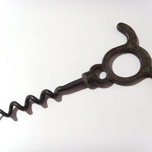 Antique Victorian 1870s THE LEVER SIGNET Corkscrew Bottle Opener Cast Iron Left Handed?