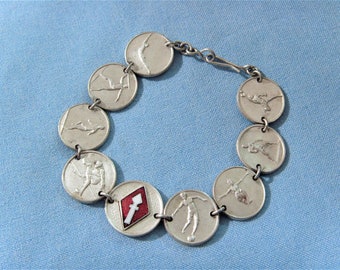 Ongebruikelijke vintage Olympische sport medaillon armband met emaille badge atletiek gymnastiek