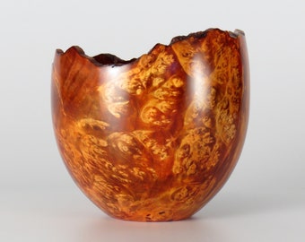 Highly figured live edge hand turned wooden bowl, dyed red orange color to enhance the grain, 5 1/4 inch diameter