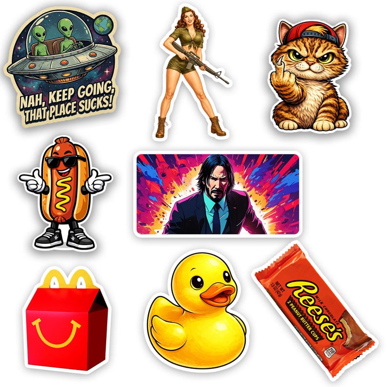 May include: A collection of colorful stickers featuring various designs. Included are stickers of aliens in a spaceship with the text "NAH, KEEP GOING, THAT PLACE SUCKS!", a woman holding a rifle, a cat giving the middle finger, a hot dog, a man in a suit, a McDonald's box, a rubber duck, and a Reese's candy bar.