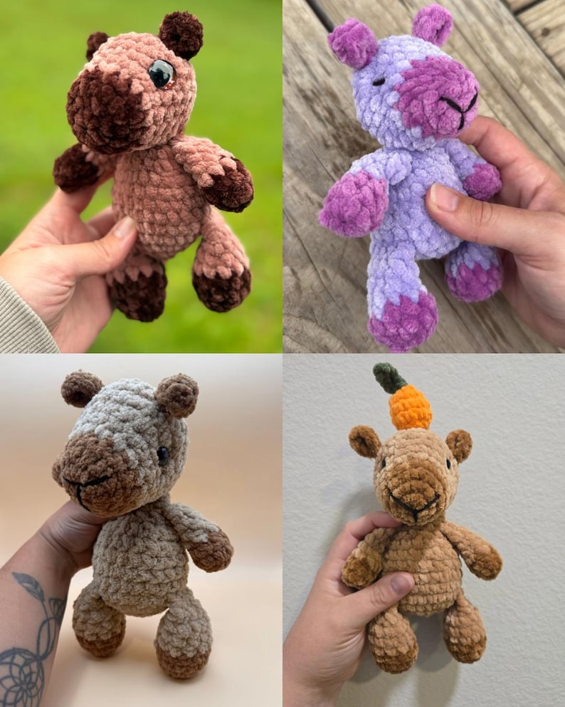 May include: A collection of four small, plush, crocheted animal figures made from soft, textured yarn. The figures include a pink and brown creature, a purple and lavender one, a beige and brown animal, and a tan one with an orange carrot top.