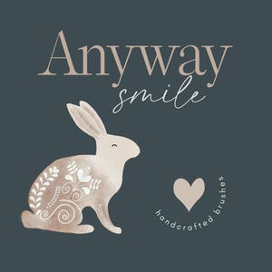May include: Digital illustration of a beige rabbit with floral patterns, a heart, and the words "Anyway smile" and "handcrafted brushes" on a dark teal background. The rabbit is in profile, with delicate details.