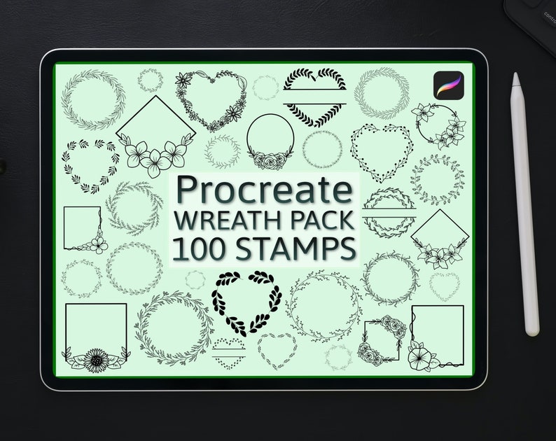 May include: A digital tablet displays a collection of 100 wreath stamps for Procreate. The wreaths are in various shapes, including circles, hearts, and squares, and feature floral and leaf designs. A stylus rests on the side.
